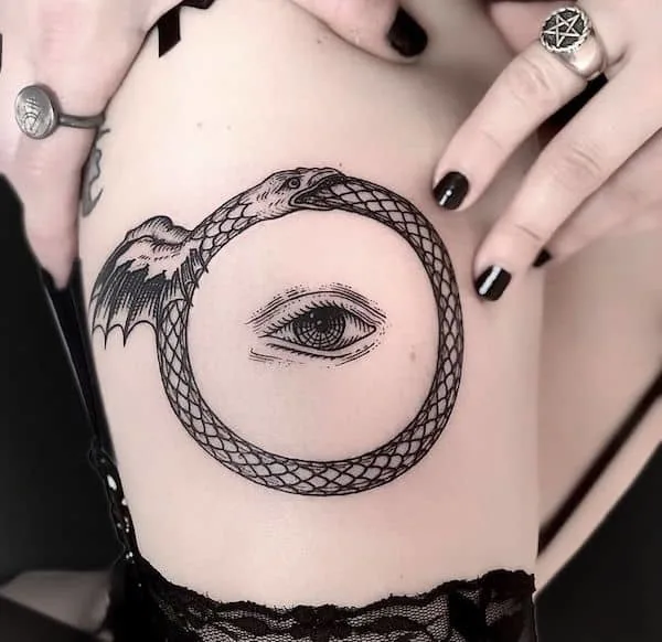 Ouroboros tattoo by @leonka.art- Wicca symbol tattoos