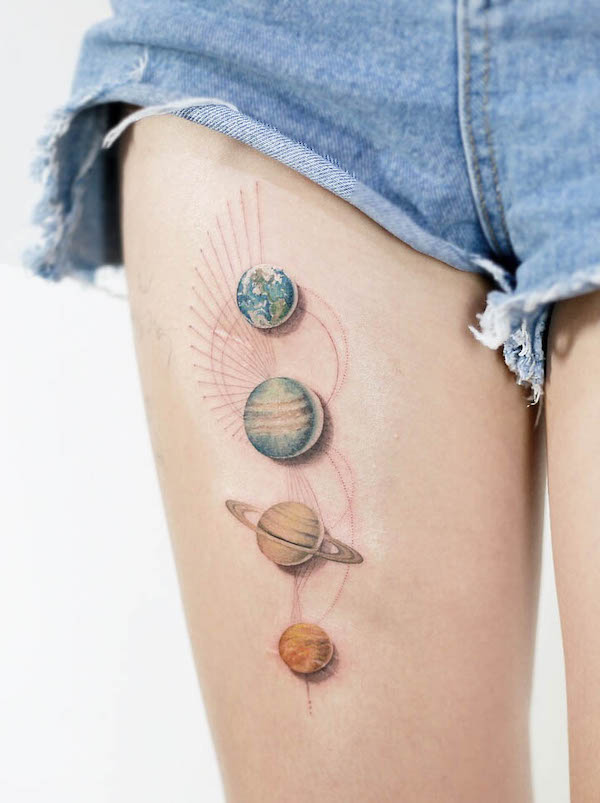 Multi-color planets cosmic thigh tattoo by @tattooist_doy