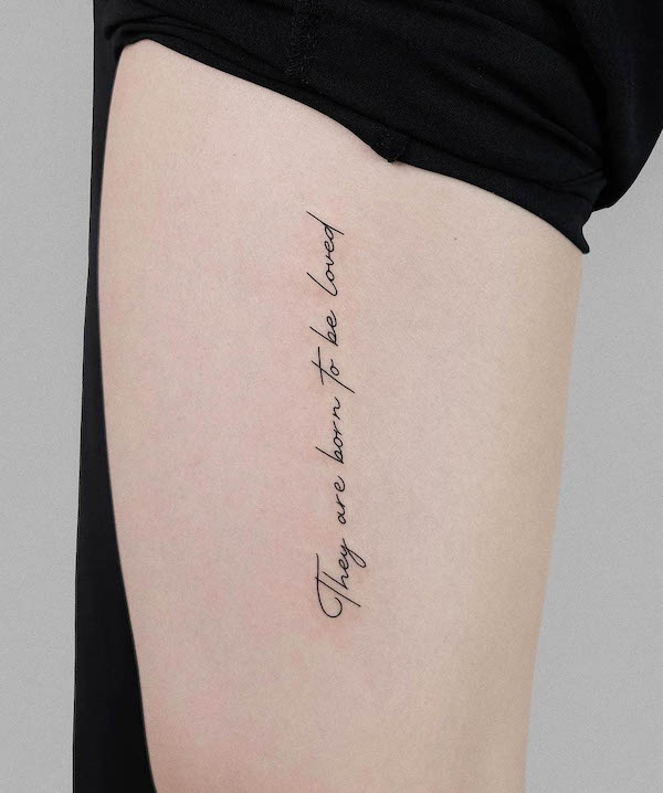 quote thigh tattoo by @floi.tattoo