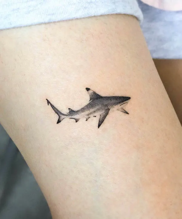 Small shark thigh tattoo by @eunyutattoo