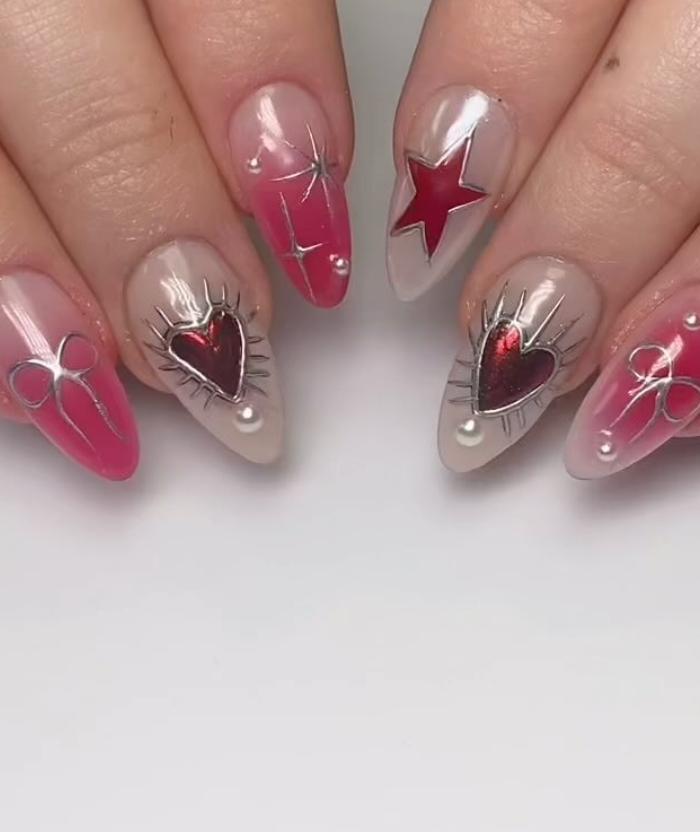 red white and pink aura nails with silver bows and details