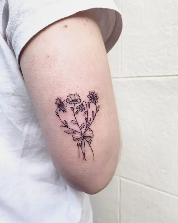 Botanical Tattoo Near The Elbow