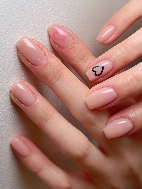 Korean Valentine's Day nail designs: nude shade with hearts