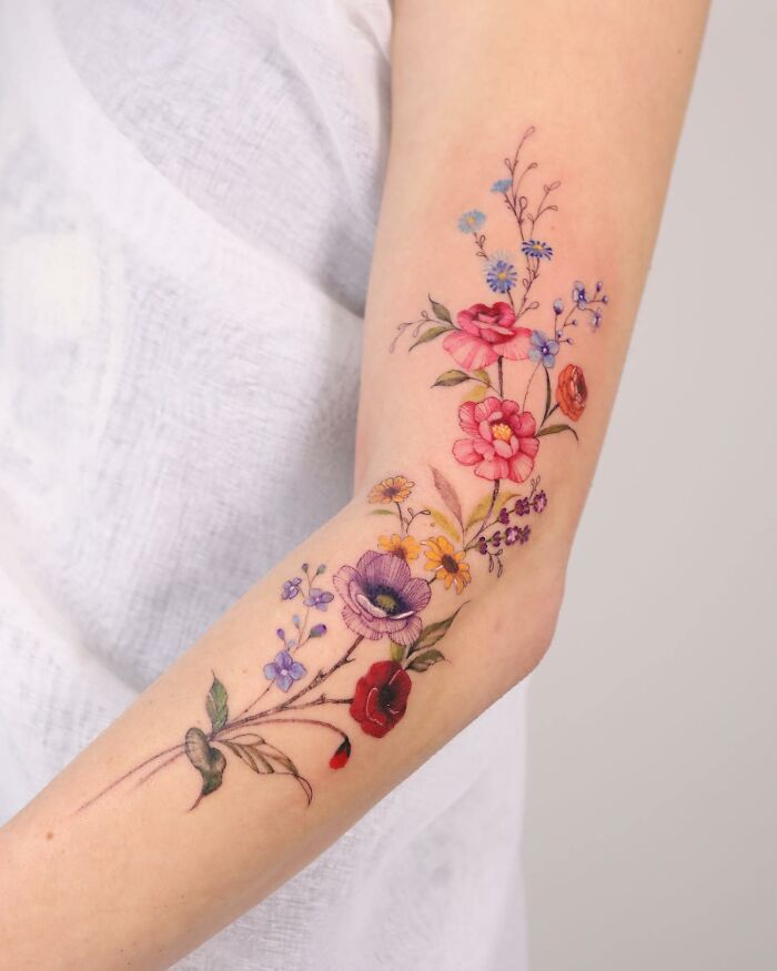 Transformative Elegance: Silo’s Exquisite Flower Tattoos And Expert Cover-UPS