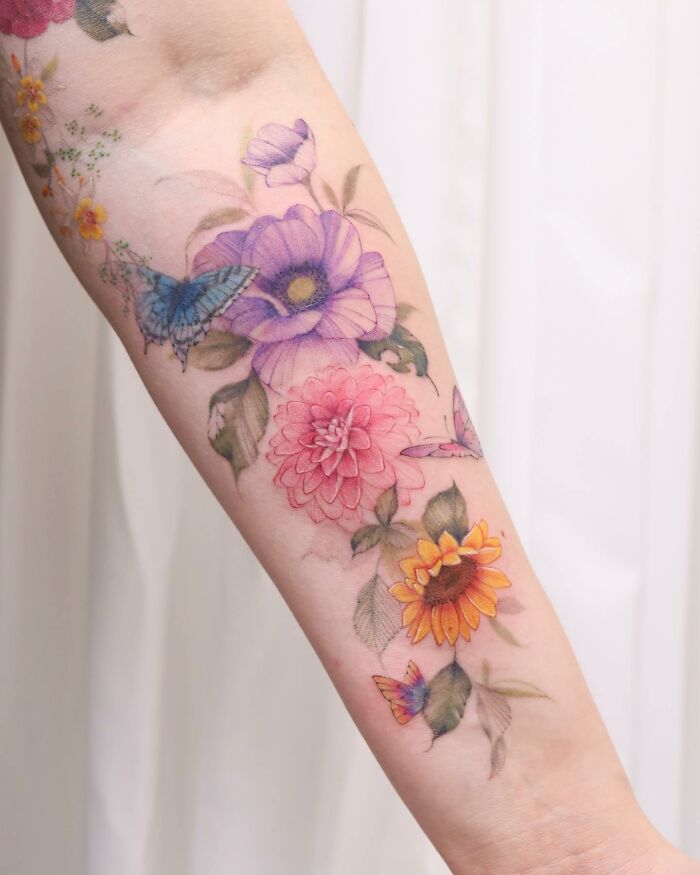 Transformative Elegance: Silo’s Exquisite Flower Tattoos And Expert Cover-UPS