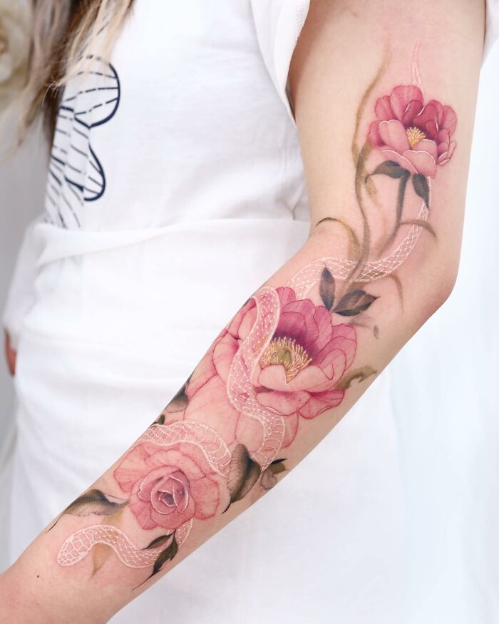 Transformative Elegance: Silo’s Exquisite Flower Tattoos And Expert Cover-UPS