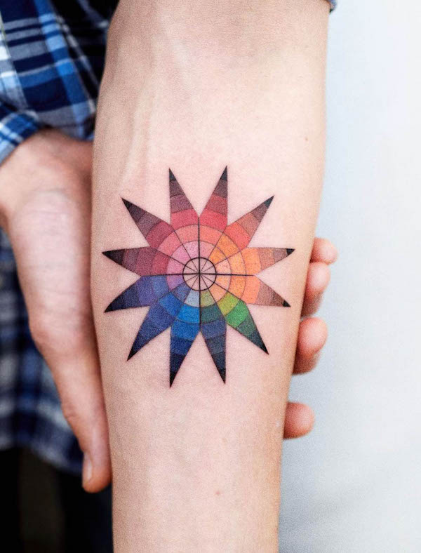 Color wheel tattoo by @nandotattooer