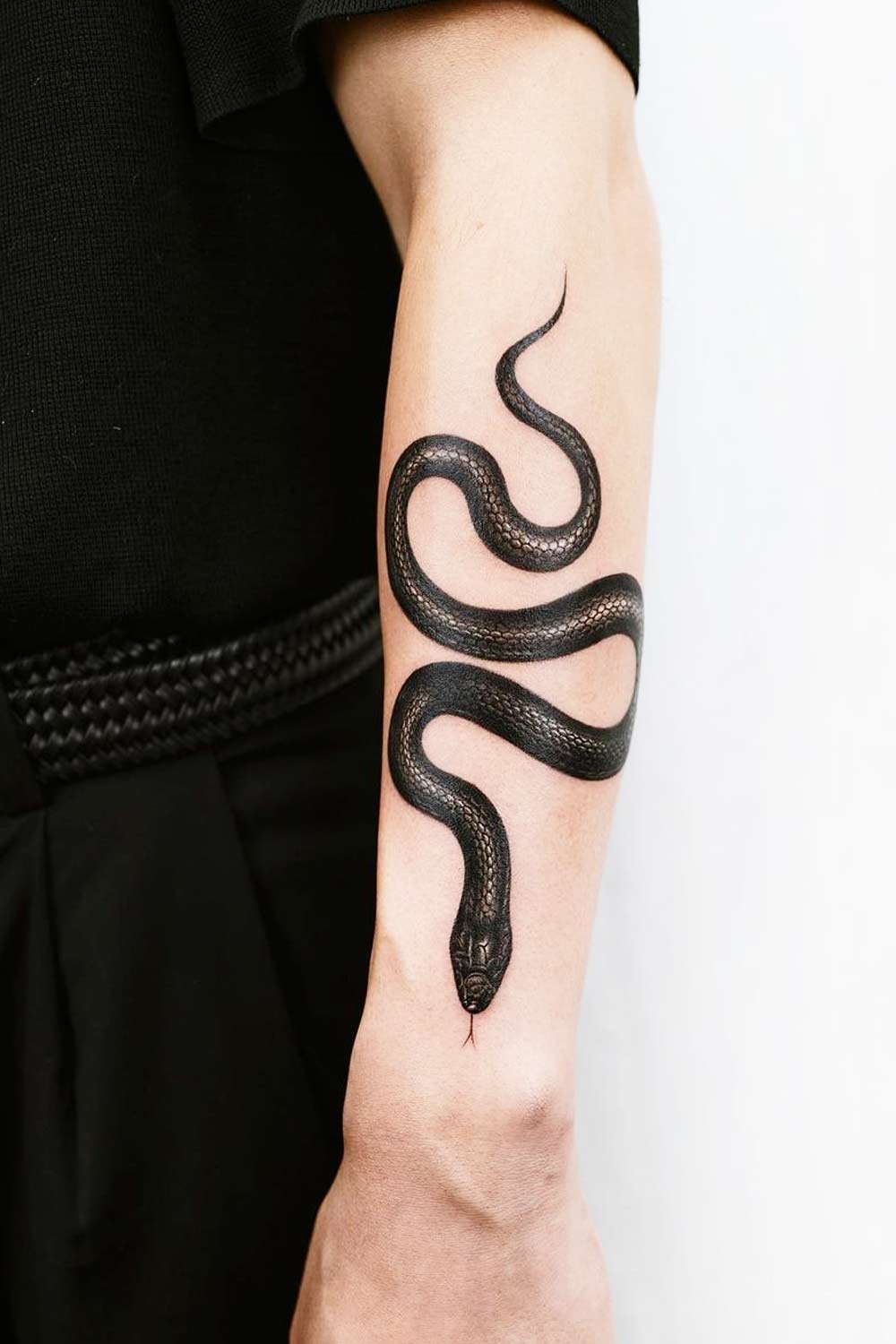 Minimalist Black Snake Tattoo