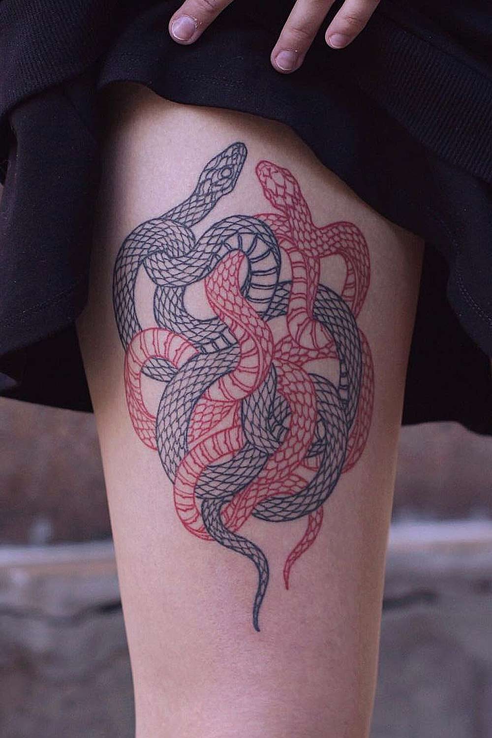 Two Snakes on Thigh Tattoo