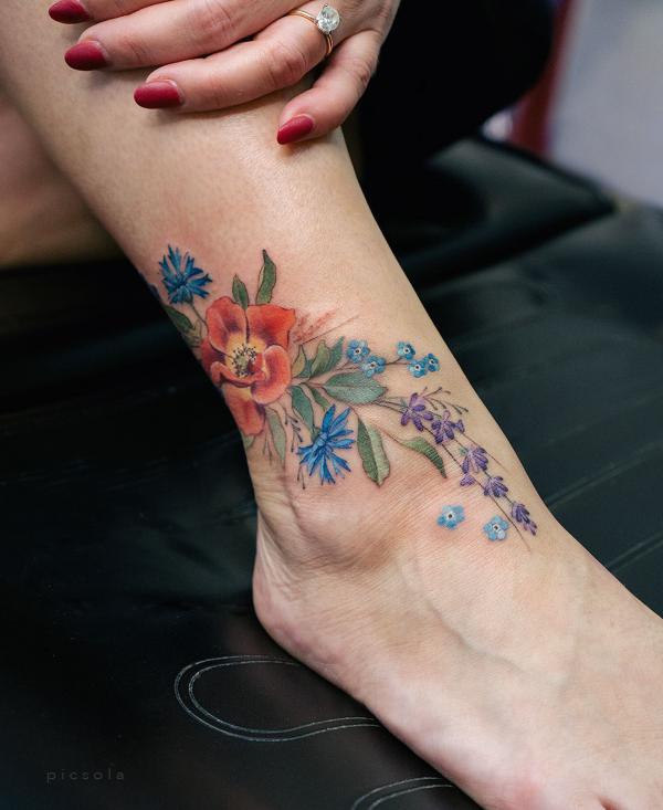 Cornflower poppy and forget me not ankle tattoo