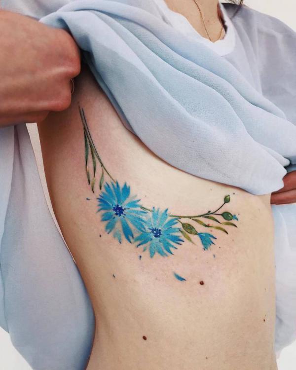 Cornflower side tattoo