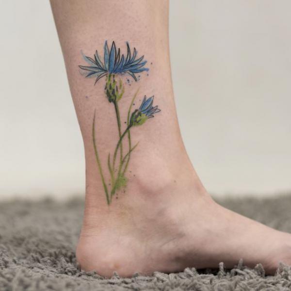 Two cornflower ankle tattoo